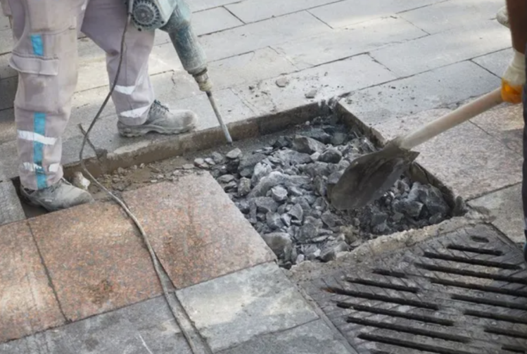 Managing Debris During Driveway, Sidewalk, and Slab Removal Work